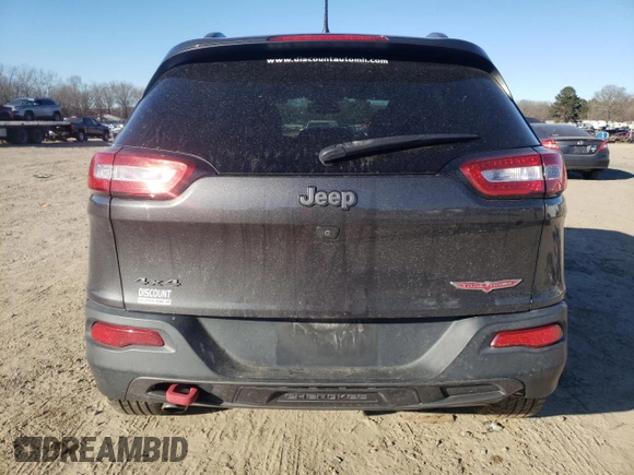 2017 Jeep Cherokee Trailhawk L Plus with VIN 1C4PJMBB5HW537036, listed as a Copart auction lot 42031035 with 115,732 mi miles and Salvage Title. Bid and sale history available at carsss.com. Image 6.