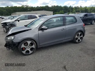 2013 Volkswagen GTI w/Conv & Sunroof z VIN WVWFD7AJ5DW083068, wystawiony jako Copart lot #61000974 z przebiegiem 126 459 mil mil oraz Szkoda całkowita • Salvage title. Historia ofert i sprzedaży dostępna na DreamBid. Obrazek 1.
