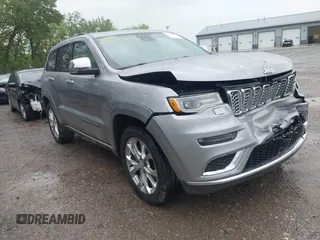 2020 Jeep Grand Cherokee Summit with VIN 1C4RJFJT4LC137073, listed as a IAAI auction lot 42265991 with 212,397 mi miles and . Bid and sale history available at DreamBid. Image 1.