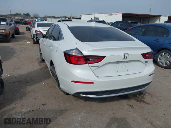2020 Honda Insight Touring with VIN 19XZE4F90LE009301, listed as a IAAI auction lot 41661665 with 73,673 mi miles and . Bid and sale history available at carsss.com. Image 3.