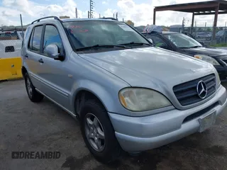 2000 Mercedes-Benz M-Class with VIN 4JGAB54E6YA150486, listed as a IAAI auction lot 41889020 with 127,415 mi miles. Bid and sale history available at carsss.com. Image 1.