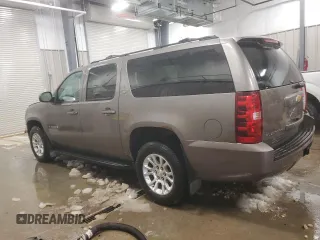 2013 Chevrolet Suburban LT with VIN 1GNSKJE72DR236026, listed as a Copart auction lot 86153104 with 222,417 mi miles and Salvage title. Bid and sale history available at DreamBid. Image 2.