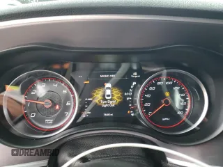 2019 Dodge Charger Scat Pack z VIN 2C3CDXGJ9KH593210, wystawiony jako Copart lot #56586775 z przebiegiem 73 405 mil mil oraz Szkoda całkowita • Salvage title. Historia ofert i sprzedaży dostępna na DreamBid. Obrazek 9.