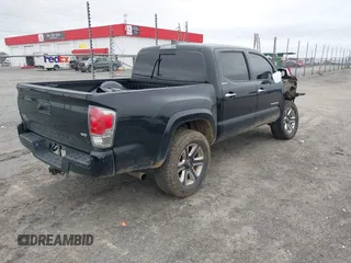 2018 Toyota Tacoma SR with VIN 3TMGZ5AN5JM159932, listed as a IAAI auction lot 41731655 with 138,780 mi miles. Bid and sale history available at carsss.com. Image 4.