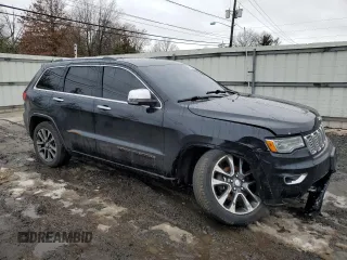 2017 Jeep Grand Cherokee Overland with VIN 1C4RJFCGXHC927470, listed as a Copart auction lot 45132185 with 119,543 mi miles and Salvage Title. Bid and sale history available at carsss.com. Image 4.