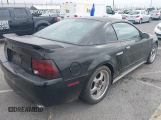 2002 Ford Mustang GT Deluxe with VIN 1FAFP42X12F187410, listed as a IAAI auction lot 42117675 with 175,052 mi miles. Bid and sale history available at carsss.com. Image 4.