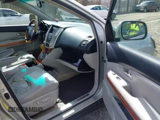 2007 Lexus RX 400h with VIN JTJGW31U672001021, listed as a IAAI auction lot 42209431 with 245,653 mi miles and . Bid and sale history available at DreamBid. Image 5.
