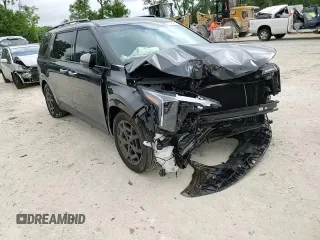 2025 Kia Carnival SX with VIN KNDNE5K37S6490478, listed as a Copart auction lot 51389565 with 6,929 mi miles and Salvage Title. Bid and sale history available at DreamBid. Image 12.