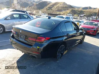 2021 BMW 5 Series 530e with VIN WBA13AG09MCF52172, listed as a IAAI auction lot 41664307 with 72,454 mi miles and . Bid and sale history available at carsss.com. Image 4.