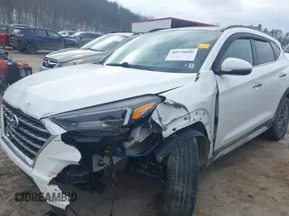 2019 Hyundai Tucson Ultimate with VIN KM8J3CALXKU016834, listed as a IAAI auction lot 40970606 with 104,208 mi miles. Bid and sale history available at carsss.com. Image 6.