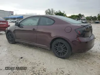 2010 Scion tC z VIN JTKDE3B79A0309636, wystawiony jako Copart lot #58693935 z przebiegiem 153 413 mil mil oraz Czysty tytuł • Clean title. Historia ofert i sprzedaży dostępna na DreamBid. Obrazek 2.