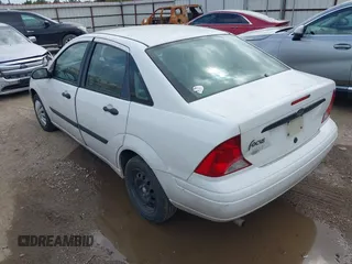 2003 Ford Focus LX with VIN 1FAFP33P33W156797, listed as a IAAI auction lot 42086475 with 200,727 mi miles and . Bid and sale history available at carsss.com. Image 3.