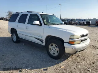 2004 Chevrolet Tahoe LT with VIN 1GNEC13Z74R164089, listed as a Copart auction lot 44317175 with 165,752 mi miles and Salvage Title. Bid and sale history available at carsss.com. Image 4.