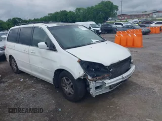 2007 Honda Odyssey EX-L z VIN 5FNRL387X7B428221, wystawiony jako IAAI lot #42257643 z przebiegiem 275 393 mil mil oraz . Historia ofert i sprzedaży dostępna na DreamBid. Obrazek 1.