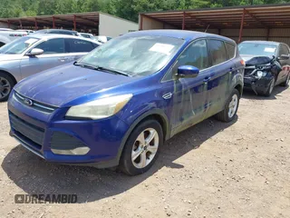 2014 Ford Escape SE z VIN 1FMCU9GX6EUD67330, wystawiony jako IAAI lot #42705724 z przebiegiem 171 996 mil mil oraz . Historia ofert i sprzedaży dostępna na DreamBid. Obrazek 2.