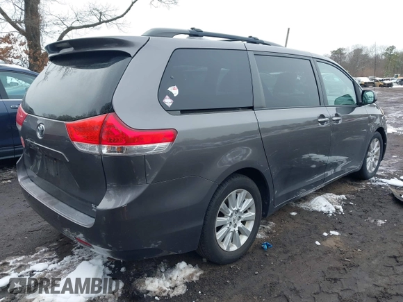2012 Toyota Sienna XLE with VIN 5TDDK3DC9CS047014, listed as a IAAI auction lot 41551585 with 164,440 mi miles. Bid and sale history available at carsss.com. Image 4.