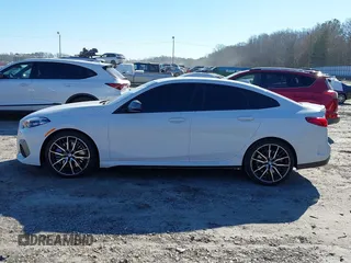 2021 BMW 2 Series M235i xDrive with VIN WBA13AL06M7G61056, listed as a IAAI auction lot 41140205 with 49,413 mi miles and . Bid and sale history available at DreamBid. Image 14.