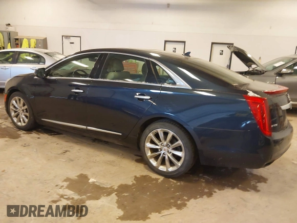 2014 Cadillac XTS Luxury with VIN 2G61M5S39E9325923, listed as a IAAI auction lot 41253343 with 69,319 mi miles. Bid and sale history available at carsss.com. Image 3.