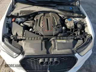 2016 Audi S6 Premium Plus z VIN WAUF2AFC8GN090536, wystawiony jako Copart lot #53939585 z przebiegiem 141 333 mil mil oraz Szkody całkowita. Historia ofert i sprzedaży dostępna na DreamBid. Obrazek 11.
