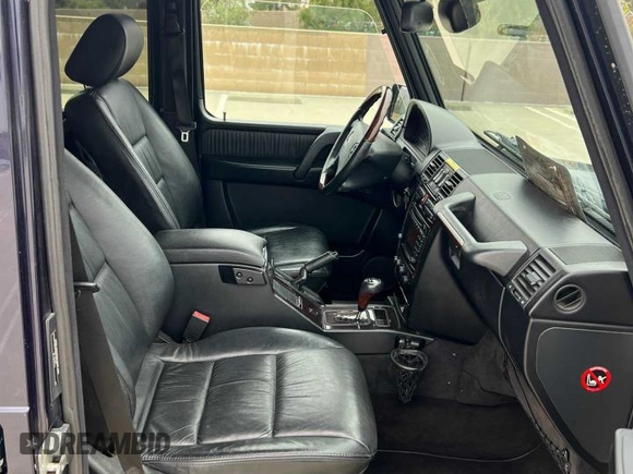 2002 Mercedes-Benz G-Class with VIN WDCYR49E72X133986, listed as a Copart auction lot 54624435 with 138,597 mi miles and Salvage Title. Bid and sale history available at carsss.com. Image 5.