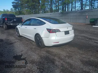 2023 Tesla Model 3 z VIN 5YJ3E1EA9PF576610, wystawiony jako IAAI lot #42206777 z przebiegiem 21 658 mil mil oraz . Historia ofert i sprzedaży dostępna na DreamBid. Obrazek 3.