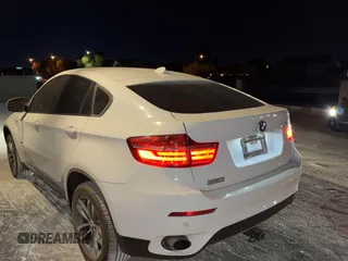 2014 BMW X6 xDrive35i with VIN 5UXFG2C58E0H09681, listed as a Copart auction lot 83922494 with 120,170 mi miles and Salvage Title. Bid and sale history available at carsss.com. Image 3.