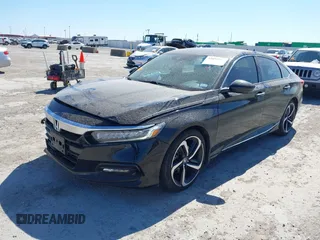2019 Honda Accord Touring z VIN 1HGCV2F96KA034782, wystawiony jako IAAI lot #41851888 z przebiegiem 99 344 mil mil oraz . Historia ofert i sprzedaży dostępna na DreamBid. Obrazek 17.