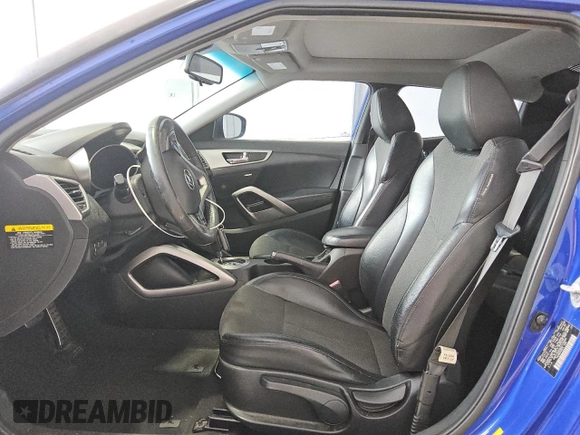 2013 Hyundai Veloster w/Black Int z VIN KMHTC6AD2DU125066, wystawiony jako Copart lot #60921325 z przebiegiem 189 503 mil mil oraz Czysty tytuł • Clean title. Historia ofert i sprzedaży dostępna na DreamBid. Obrazek 7.