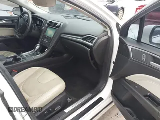 2016 Ford Fusion Titanium with VIN 3FA6P0K96GR103571, listed as a IAAI auction lot 42340764 with 180,870 mi miles and . Bid and sale history available at DreamBid. Image 5.