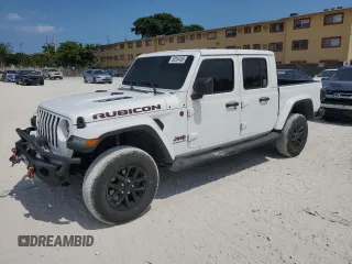 2020 Jeep Gladiator Rubicon z VIN 1C6JJTBG7LL114391, wystawiony jako Copart lot #58354485 z przebiegiem 31 340 mil mil oraz Czysty tytuł • Clean title. Historia ofert i sprzedaży dostępna na DreamBid. Obrazek 1.