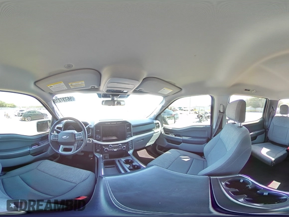 2021 Ford F-150 XL with VIN 1FTFW1E5XMFA47980, listed as a Copart auction lot 56737215 with 63,781 mi miles and Salvage title. Bid and sale history available at DreamBid. Image 14.