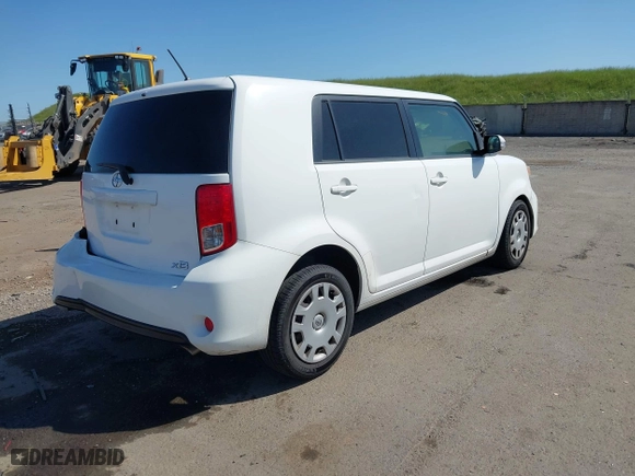 2013 Scion xB with VIN JTLZE4FEXDJ037953, listed as a IAAI auction lot 42002490 with 106,206 mi miles. Bid and sale history available at carsss.com. Image 4.