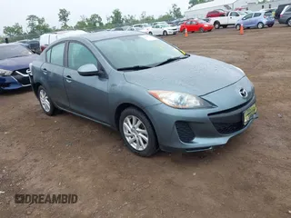 2012 Mazda 3 i Touring z VIN JM1BL1V76C1596029, wystawiony jako IAAI lot #42351719 z przebiegiem 92 550 mil mil oraz . Historia ofert i sprzedaży dostępna na DreamBid. Obrazek 1.