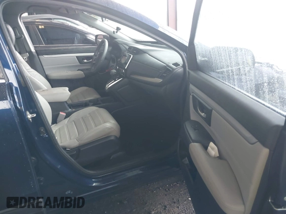 2019 Honda CR-V LX with VIN 2HKRW5H39KH400453, listed as a IAAI auction lot 40041024 with 76,932 mi miles and . Bid and sale history available at carsss.com. Image 5.