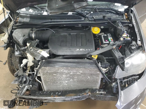 2016 Dodge Grand Caravan SXT with VIN 2C4RDGCG6GR135349, listed as a Copart auction lot 87276224 with 136,109 mi miles and Clean Title. Bid and sale history available at DreamBid. Image 12.