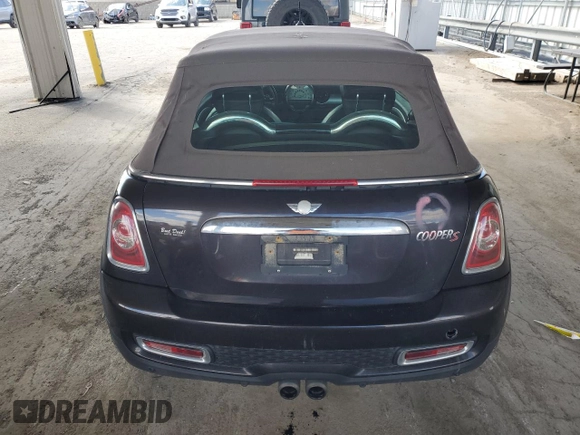 2014 MINI Convertible S with VIN WMWZP3C55ET706573, listed as a Copart auction lot 52325705 with 125,076 mi miles and Salvage Title. Bid and sale history available at DreamBid. Image 6.