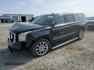 2015 GMC Yukon XL Denali with VIN 1GKS2JKJ5FR243343, listed as a Copart auction lot 51352125 with 142,996 mi miles and Salvage Title. Bid and sale history available at DreamBid. Image 1.