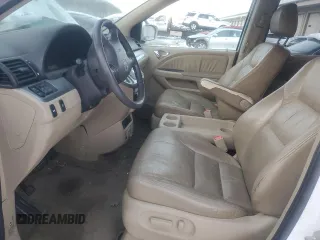 2010 Honda Odyssey EX-L with VIN 5FNRL3H77AB051869, listed as a Copart auction lot 88023625 with 248,511 mi miles and Salvage Title. Bid and sale history available at DreamBid. Image 7.