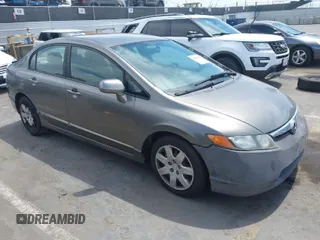 2007 Honda Civic Sdn LX with VIN 1HGFA165X7L046655, listed as a IAAI auction lot 42040146 with 151,751 mi miles. Bid and sale history available at carsss.com. Image 1.