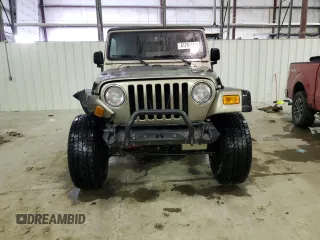 2003 Jeep Wrangler Rubicon z VIN 1J4FA69S13P345591, wystawiony jako Copart lot #41741685 z przebiegiem 85 335 mil mil oraz Szkoda całkowita • Salvage title. Historia ofert i sprzedaży dostępna na DreamBid. Obrazek 5.