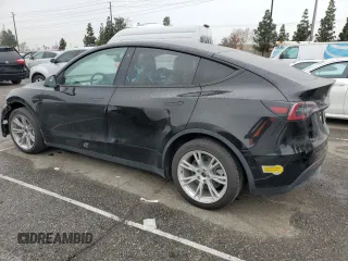 2021 Tesla Model Y Long Range with VIN 5YJYGDEEXMF294556, listed as a Copart auction lot 46668035 with 42,772 mi miles and Salvage Title. Bid and sale history available at DreamBid. Image 2.