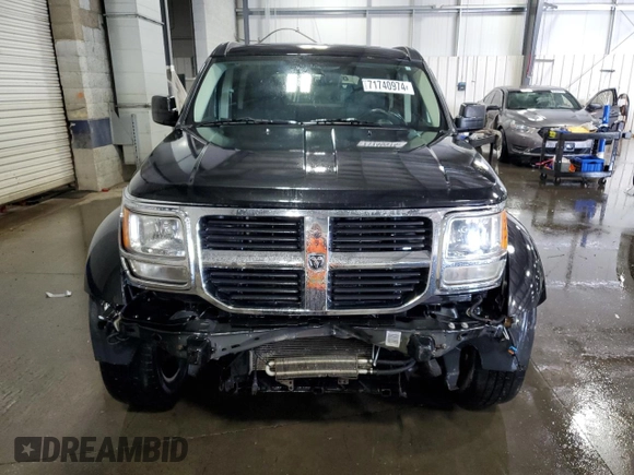 2008 Dodge Nitro SLT z VIN 1D8GU58KX8W206104, wystawiony jako Copart lot #71740974 z przebiegiem 236 981 mil mil oraz Szkoda całkowita • Salvage title. Historia ofert i sprzedaży dostępna na DreamBid. Obrazek 5.