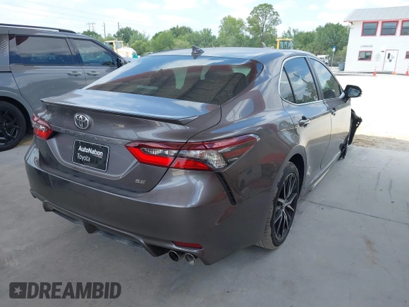 2022 Toyota Camry SE with VIN 4T1T11AK6NU639527, listed as a IAAI auction lot 42092828 with 65,420 mi miles and . Bid and sale history available at DreamBid. Image 4.