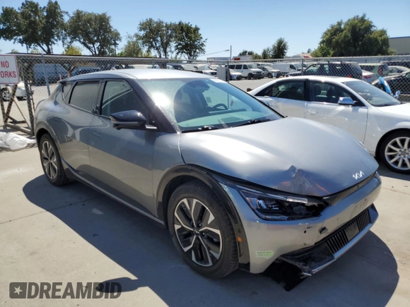 2022 Kia EV6 Wind with VIN KNDC3DLCXN5086669, listed as a Copart auction lot 68265344 with 74,711 mi miles and Salvage Title. Bid and sale history available at carsss.com. Image 4.