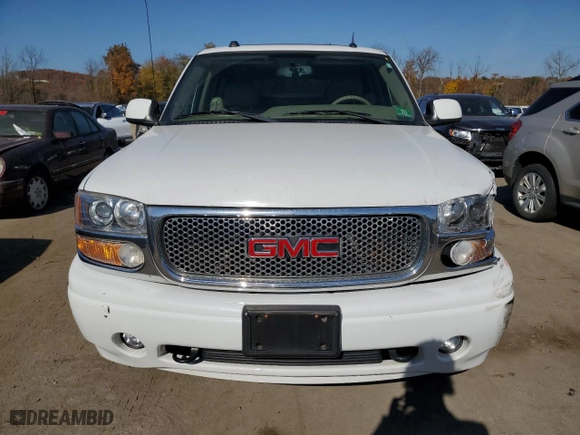 2005 GMC Yukon Denali with VIN 1GKEK63U75J163204, listed as a Copart auction lot 77300834 with 92,096 mi miles and Salvage Title. Bid and sale history available at carsss.com. Image 5.