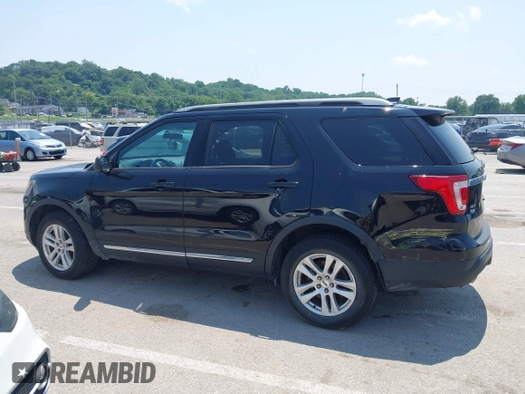 2018 Ford Explorer XLT with VIN 1FM5K8DH7JGC60950, listed as a IAAI auction lot 42335835 with 97,801 mi miles and . Bid and sale history available at DreamBid. Image 14.