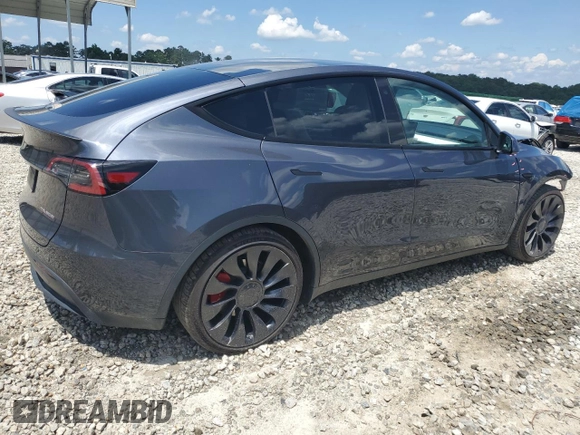 2022 Tesla Model Y Performance with VIN 7SAYGDEF3NF532311, listed as a Copart auction lot 62997535 with 60,530 mi miles and Salvage title. Bid and sale history available at DreamBid. Image 3.