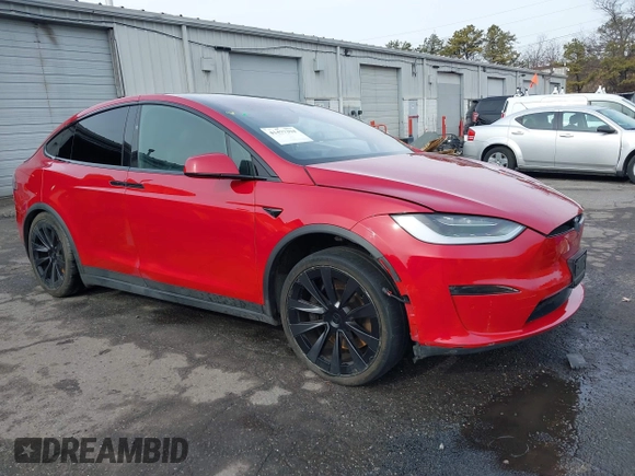 2022 Tesla Model X Plaid with VIN 7SAXCBE60NF330246, listed as a IAAI auction lot 41477394 with 51,612 mi miles and . Bid and sale history available at DreamBid. Image 1.