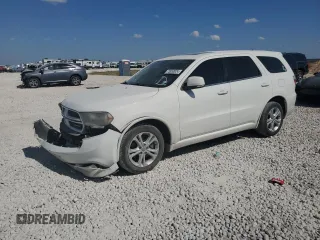2012 Dodge Durango R/T with VIN 1C4SDHCT5CC301271, listed as a Copart auction lot 73953924 with 109,039 mi miles and Salvage title. Bid and sale history available at DreamBid. Image 1.