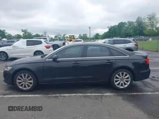 2015 Audi A6 Premium Plus z VIN WAUGFAFC6FN028169, wystawiony jako IAAI lot #42273931 z przebiegiem 100 056 mil mil oraz . Historia ofert i sprzedaży dostępna na DreamBid. Obrazek 14.